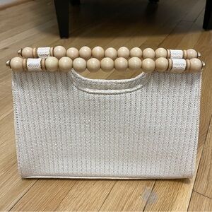 Elegant Cream Clutch with Beaded Handle